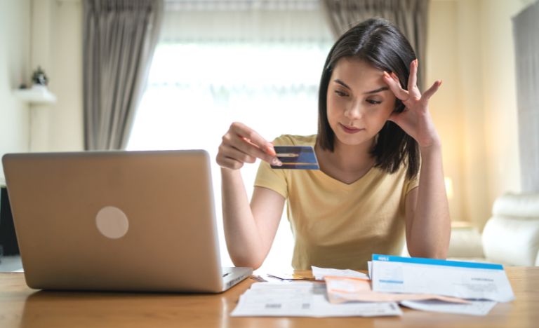 Woman worried about money and bills